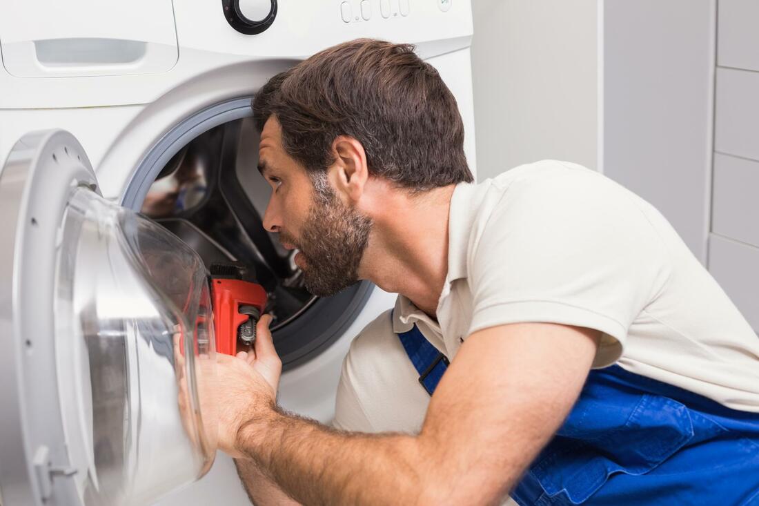 Washer won’t drain we fix in Vancouver